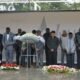 people paying there respect to those who lost their lives during the 1994 genocide