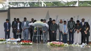 people paying there respect to those who lost their lives during the 1994 genocide