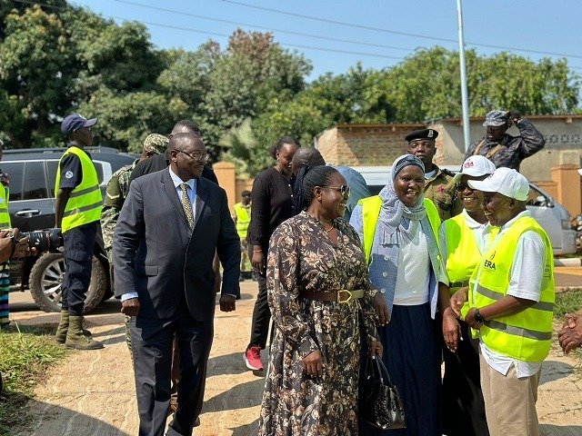 Ruth Nankairwa, Minister for Energy and Mineral Development (putting on sunglass) welcomed by officials from Electricity Regulatory Authority (ERA) in Gulu City on Tuesday.